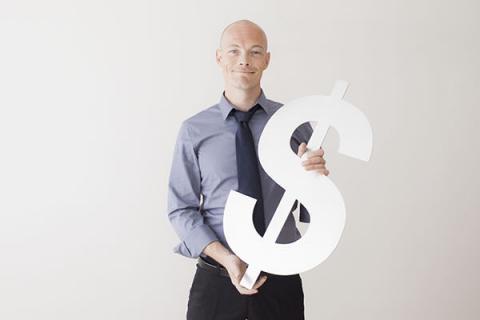 Bald man with mortgage dollar